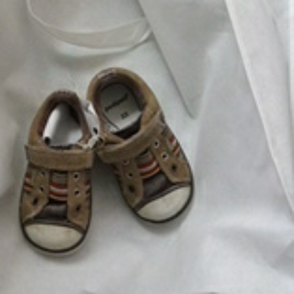Brown and multcolor shoes